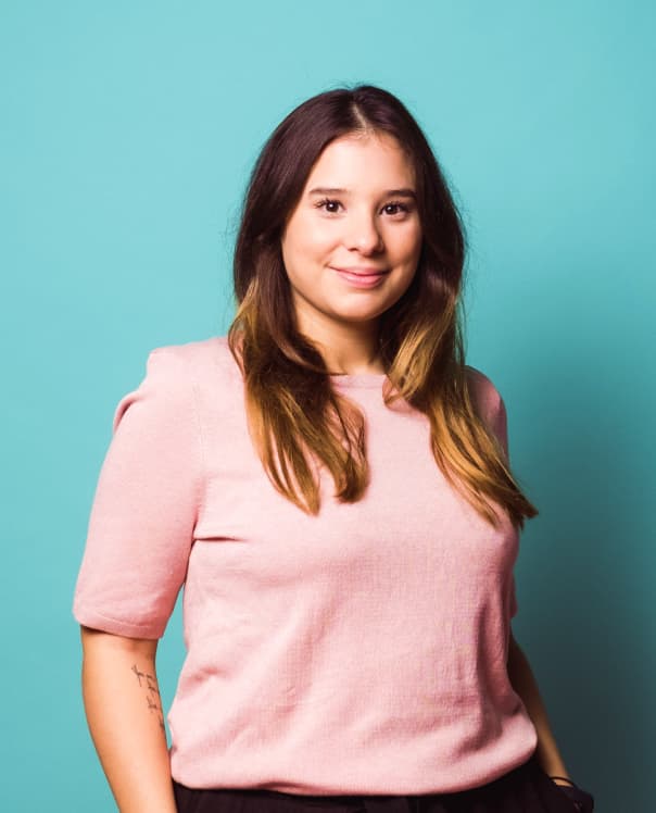 Girl with blue background loving life