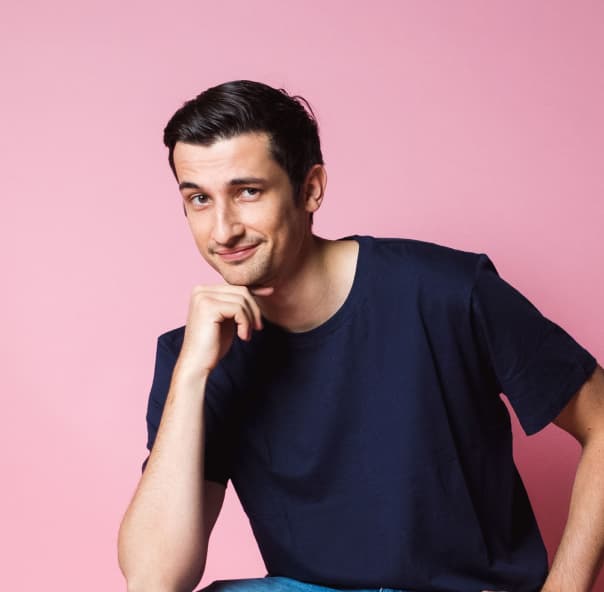 Female laughing with grey background