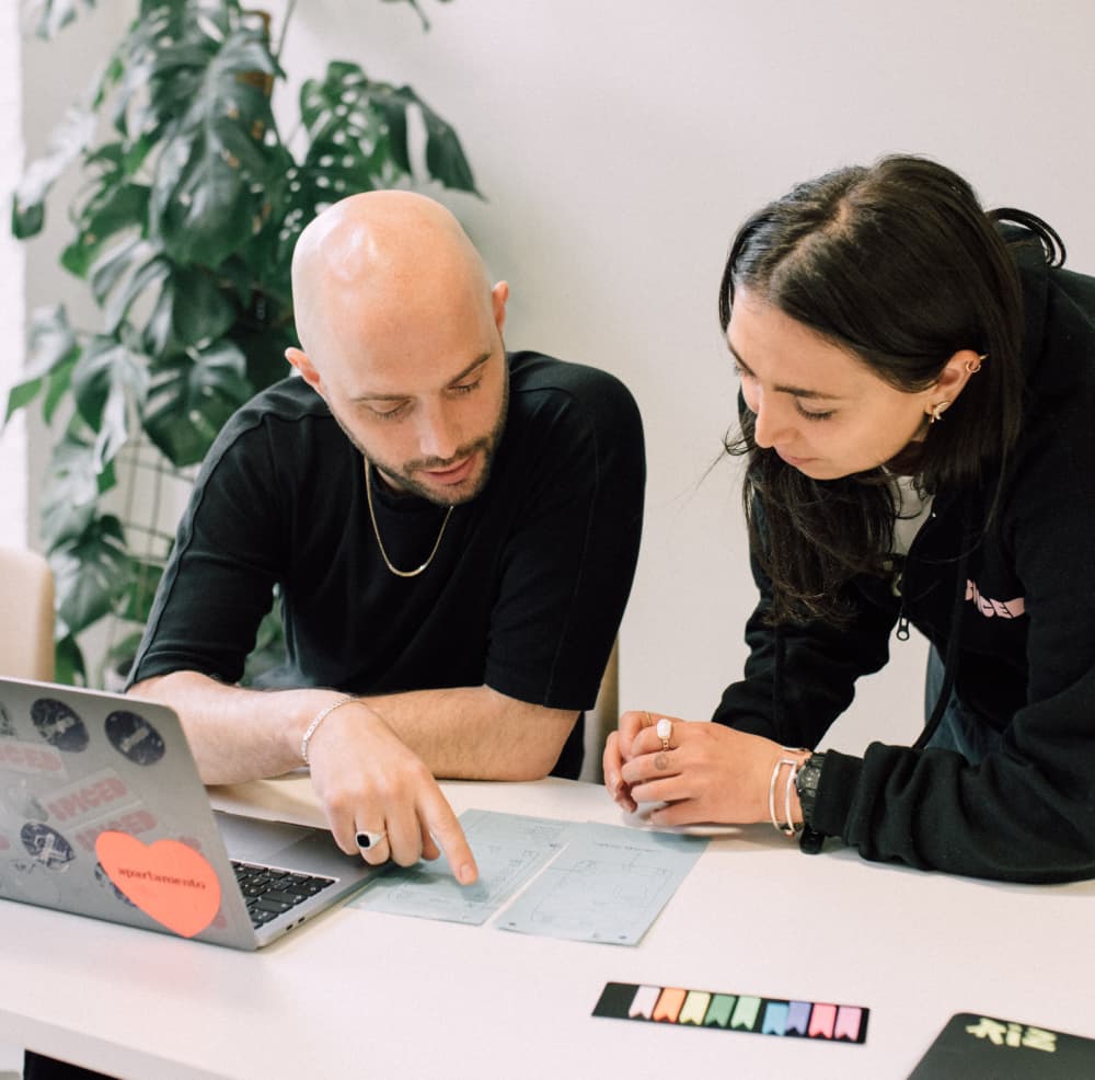 Two people in a classroom