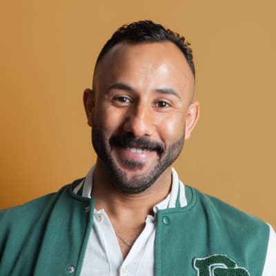 man with yellow background