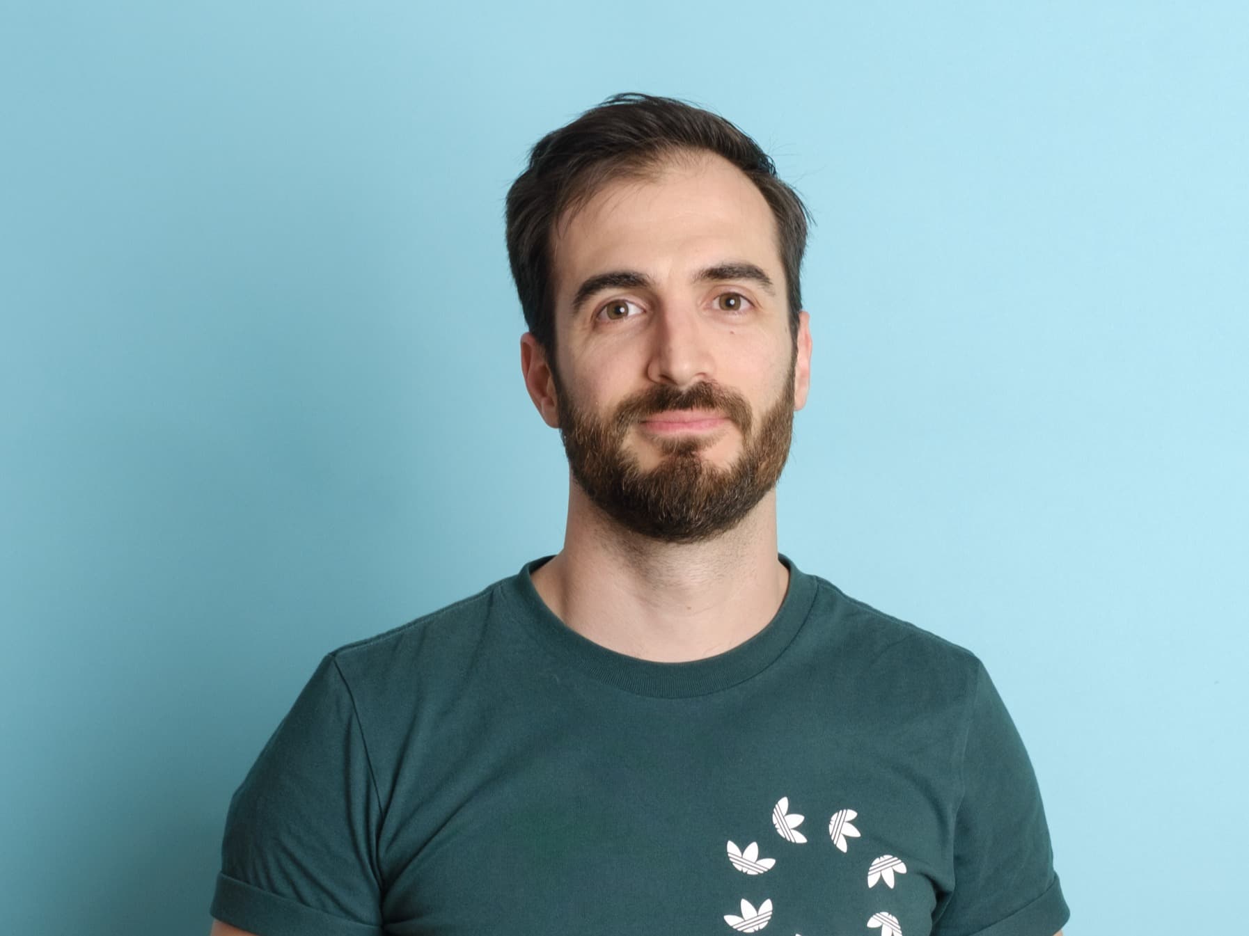 Man standing with blue background