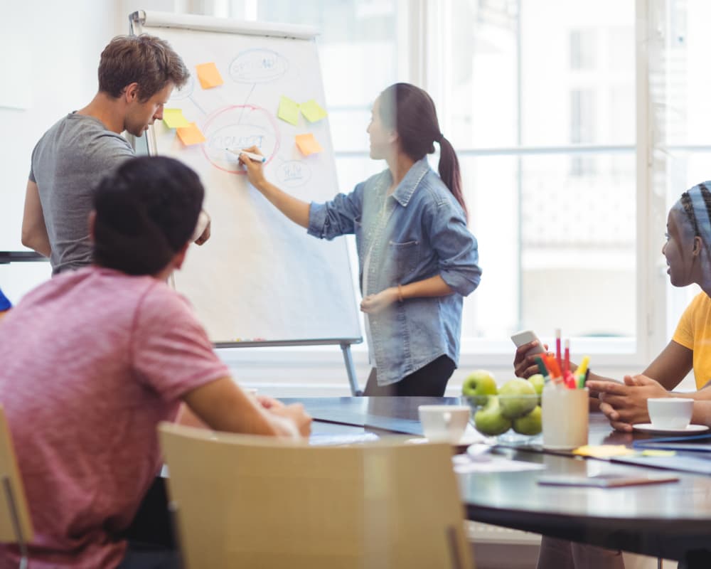 Man standing and smiling - rose background