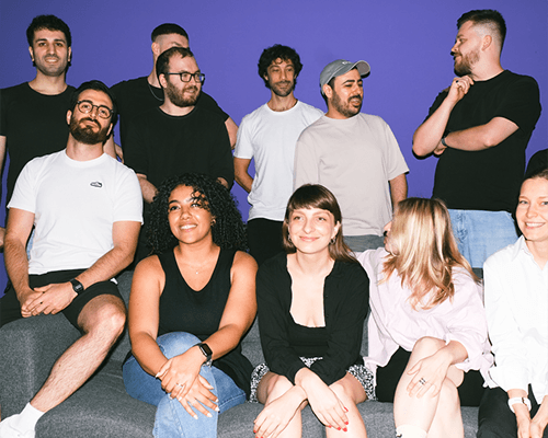 Group of people sitting together and smiling